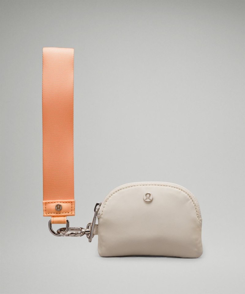 Lululemon Dual Pouch Wristlet Peach Bellini / White Opal Online Outlet Sale