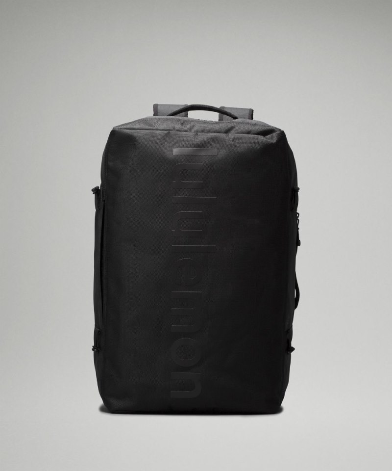 Lululemon 2-in-1 Travel Duffle Backpack 45L Black / Detours Welcome Emboss Black Online Outlet Sale