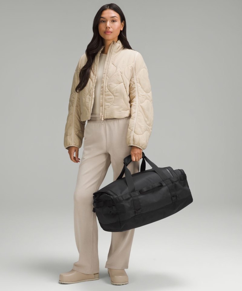 Lululemon 2-in-1 Travel Duffle Backpack 45L Black / Detours Welcome Emboss Black Online Outlet Sale