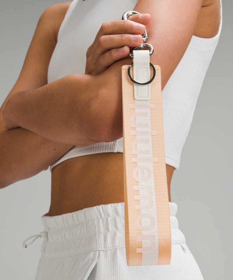 Lululemon Never Lost Keychain *Wordmark Peach Bellini / White Opal / White Online Outlet Sale